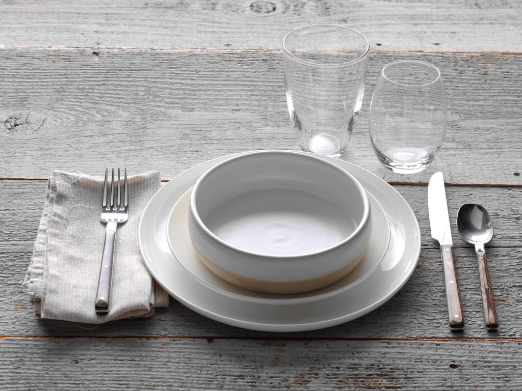 Elevate your at home dining experience with a casual dinner party place setting